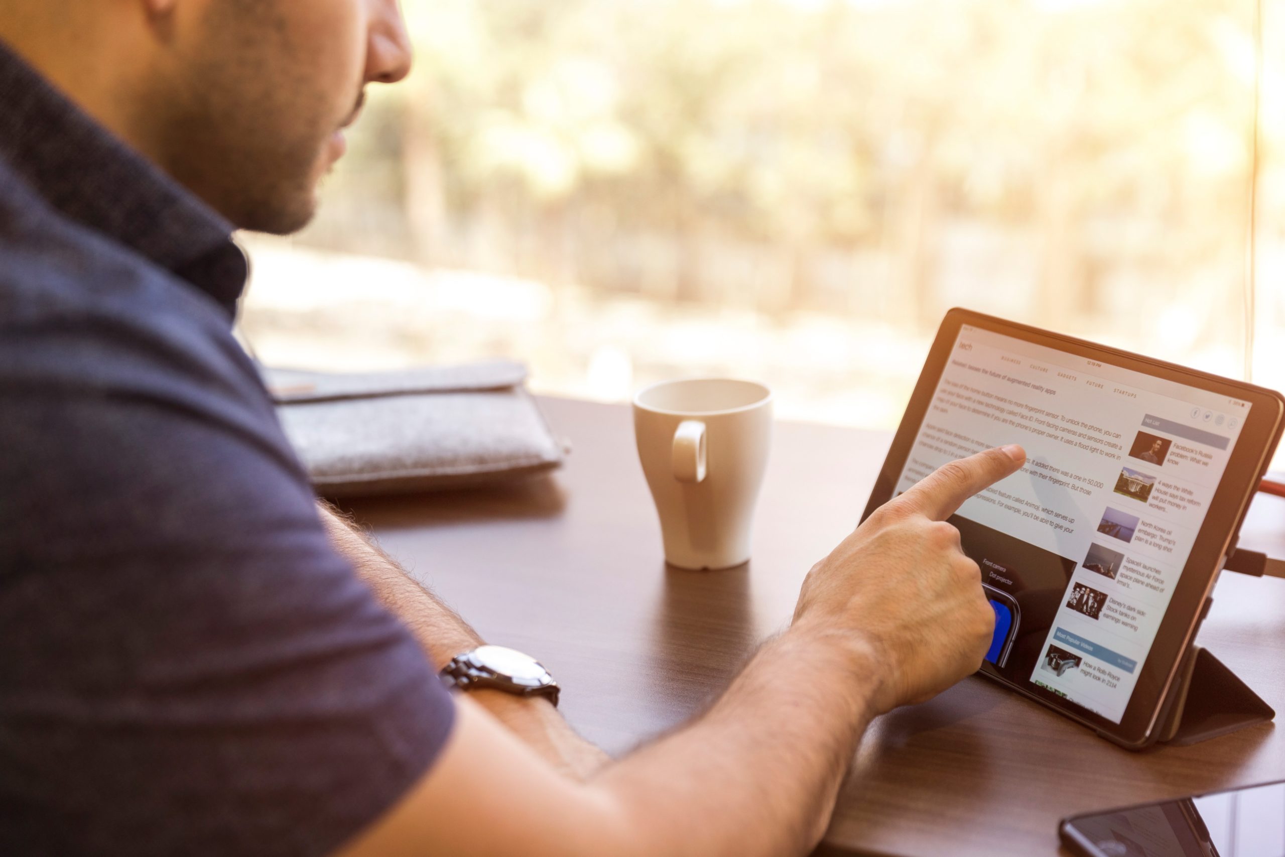 Person using Linkedin on an ipad